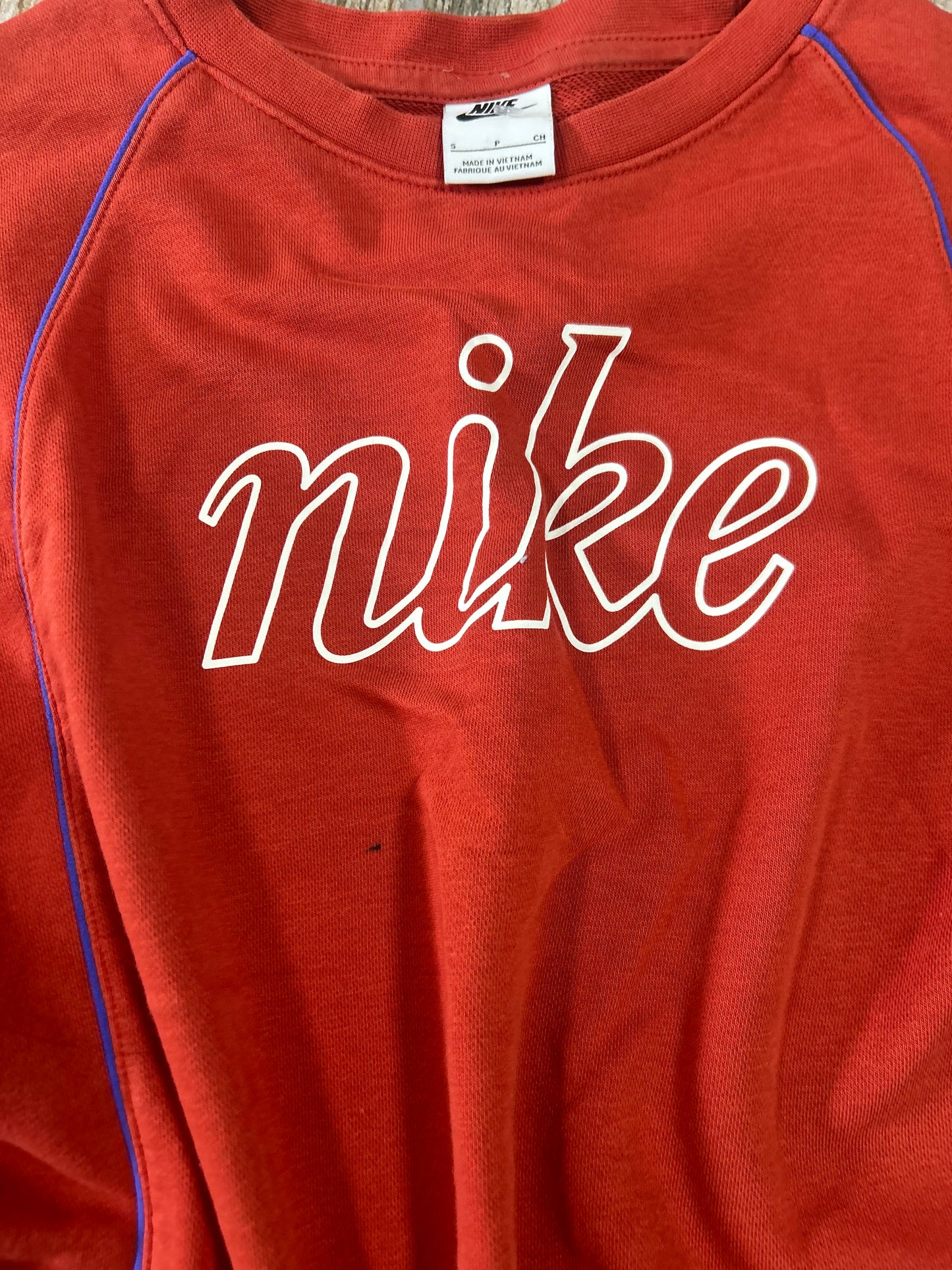 Nike size small (ink spot) burnt orange and royal blue