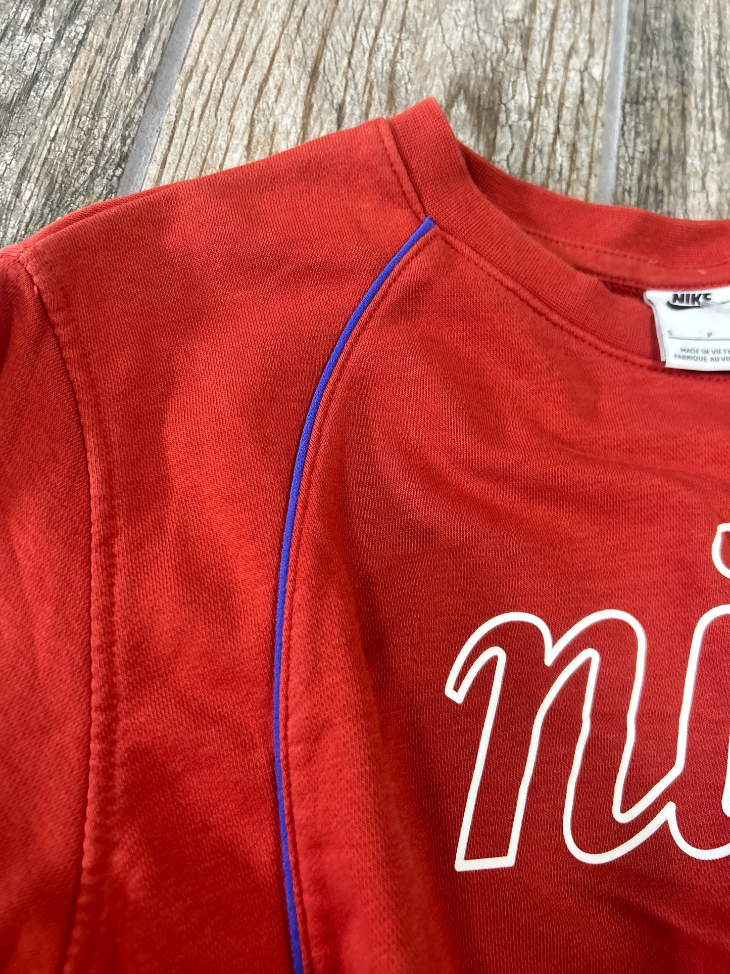 Nike size small (ink spot) burnt orange and royal blue
