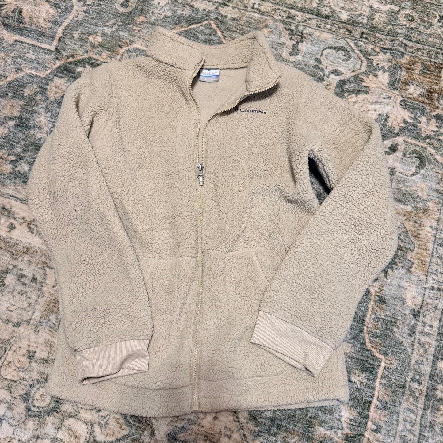 Columbia fits like a medium/large