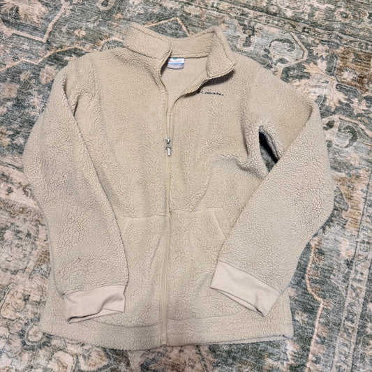 Columbia fits like a medium/large