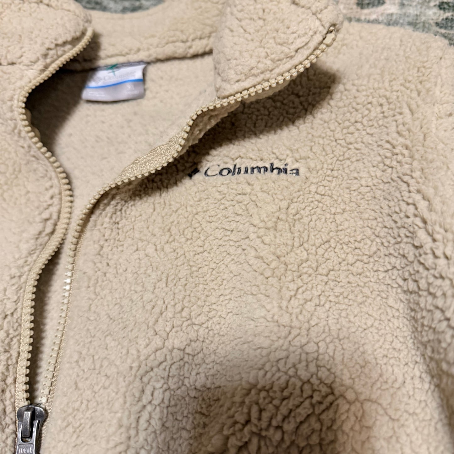 Columbia fits like a medium/large