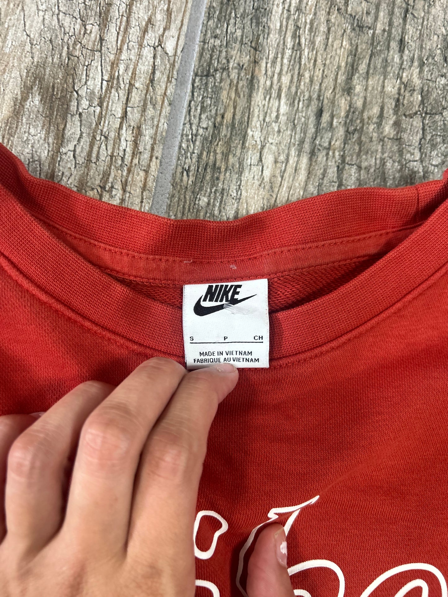Nike size small (ink spot) burnt orange and royal blue