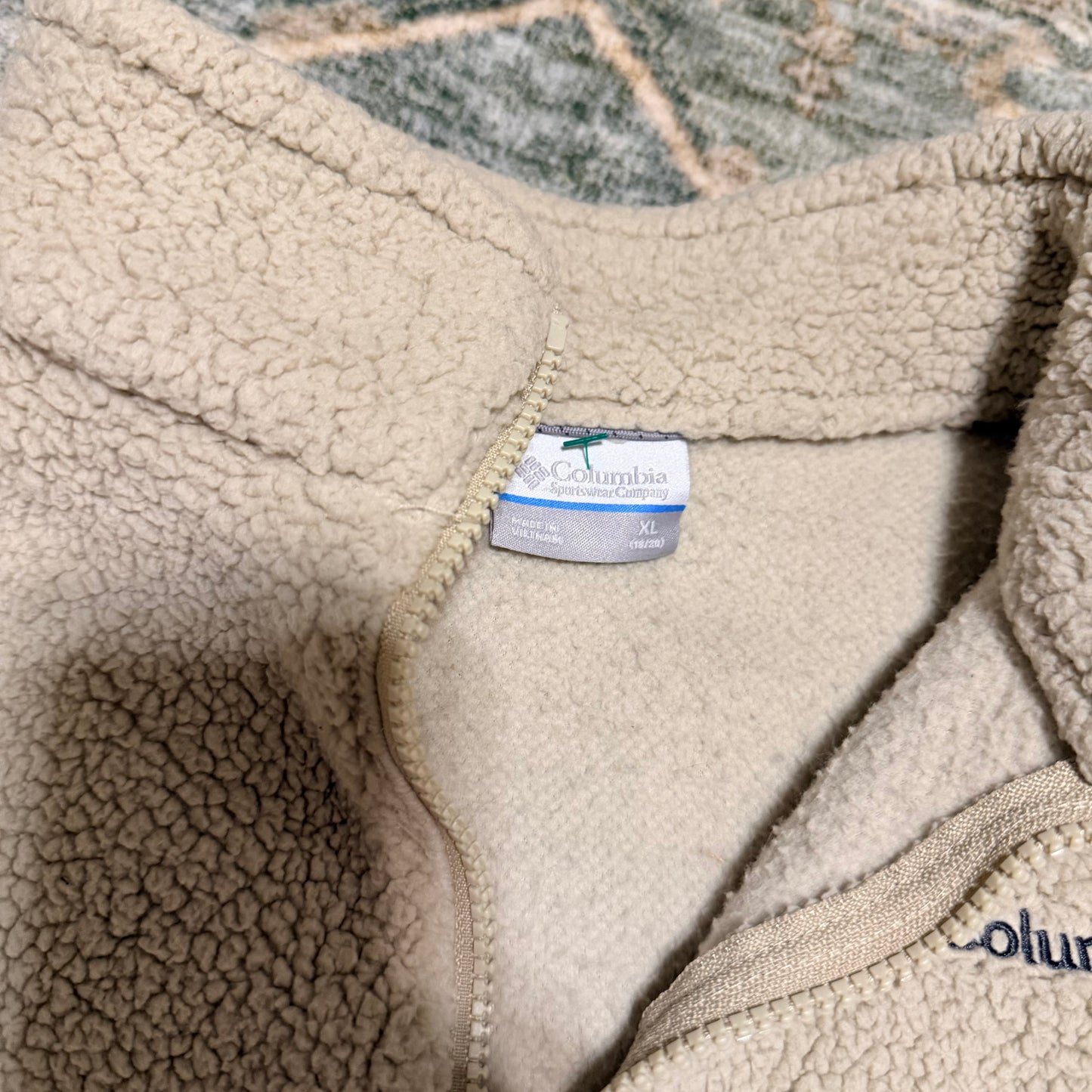 Columbia fits like a medium/large